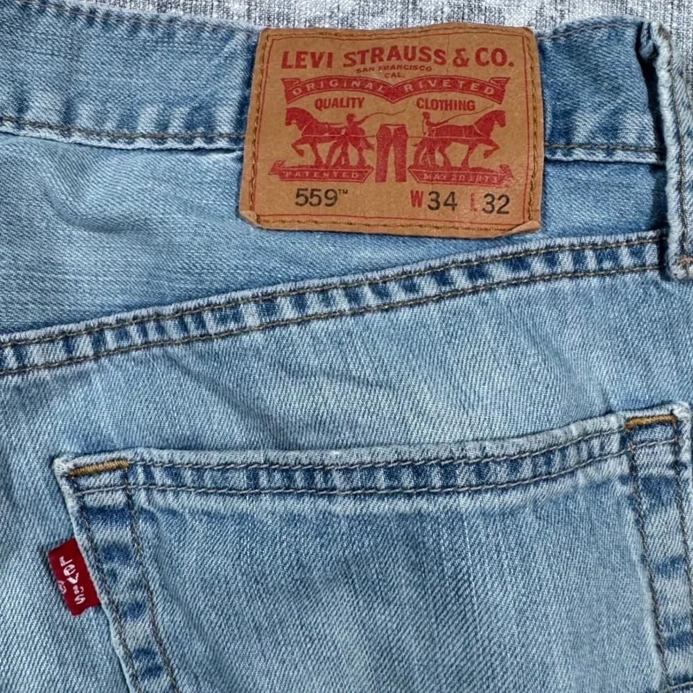 Levi's 559 Relaxed Straight Jeans Mens 34x32 Light Wash Blue Denim 00559-0363